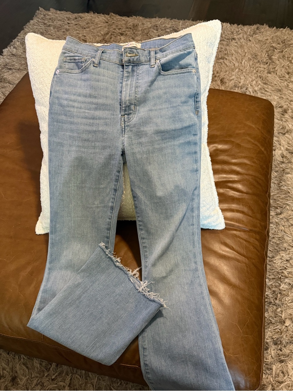 Frame Denim Light Blue Flare Jeans with Frayed Hem